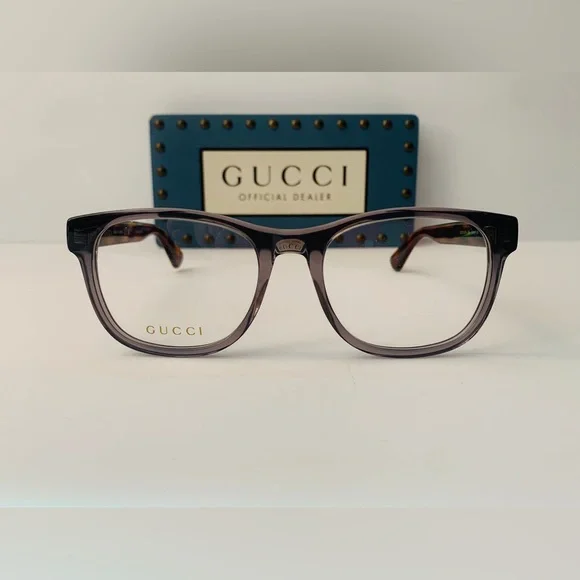 Gucci's GG0004ON features soft lines frames acetate front. Iconic web effect